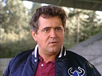 Howard Storey as Coach Grogan