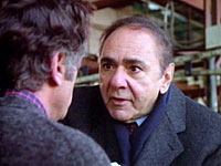 Michael Constantine as Sam Leland