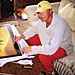 Autographing Stargate lithographs, at home in Malibu - January, 2002