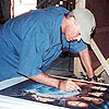 Richard autographing merchandise for Lightspeed