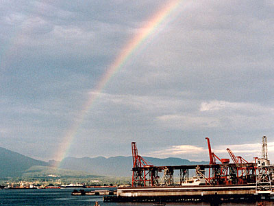 A spectacular rainbow appears over the set location.