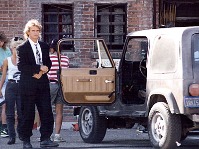 Richard in costume prepares for a scene with the jeep